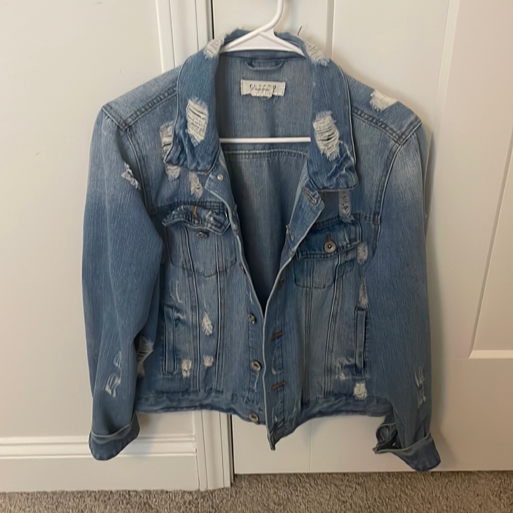Distressed denim jacket